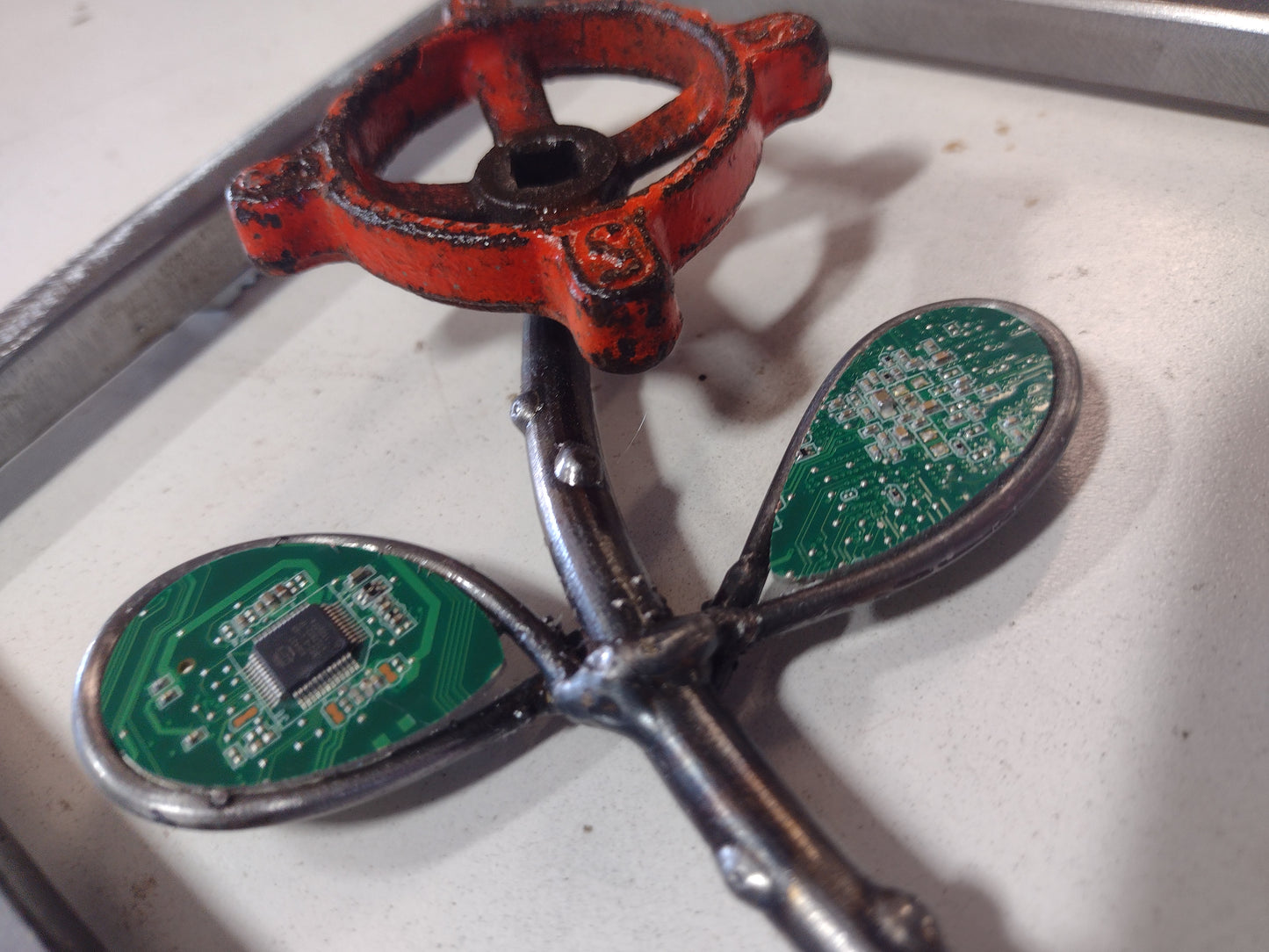 Rustic metal flower w/ computer mother board accents