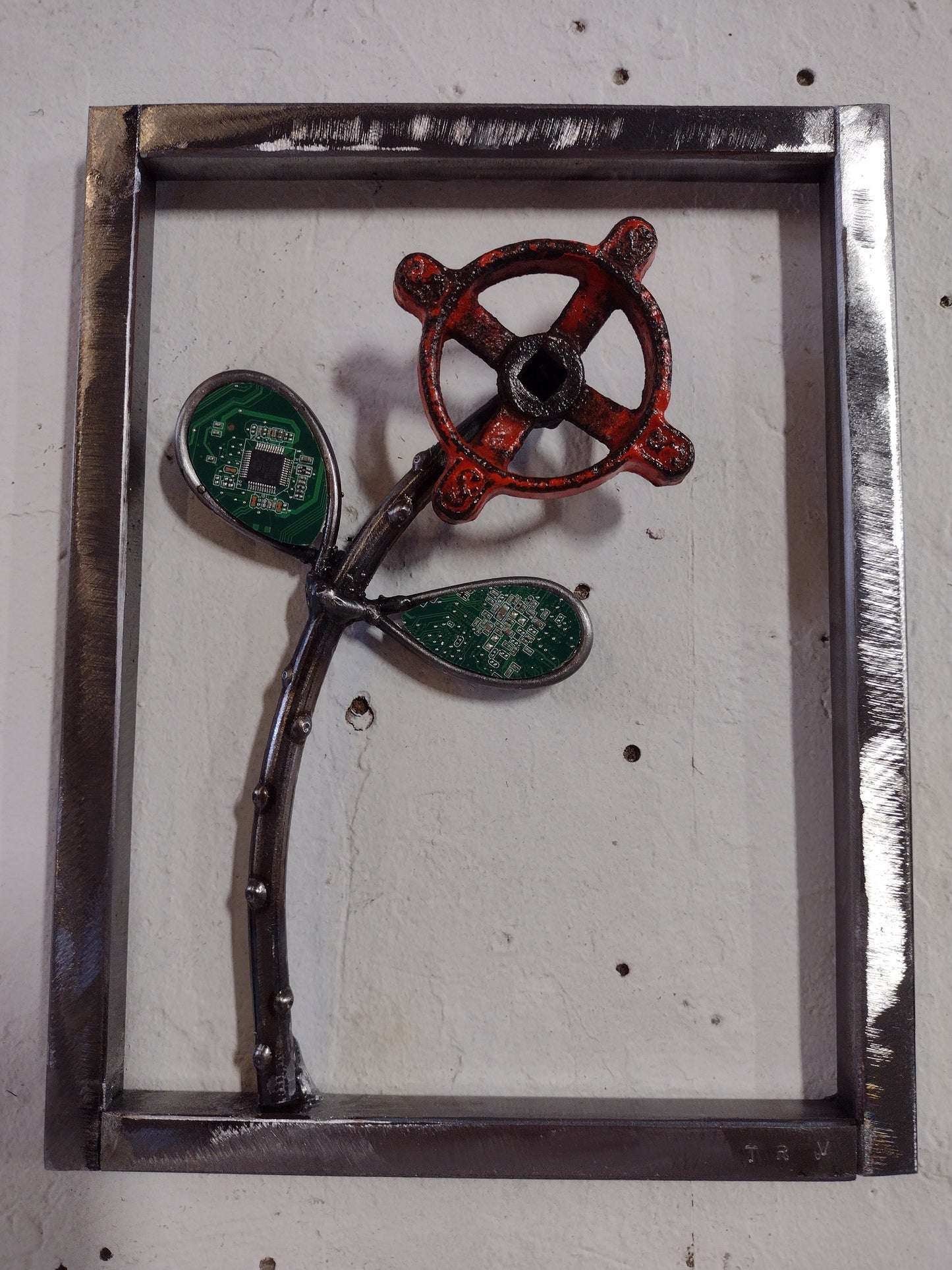 Rustic metal flower w/ computer mother board accents